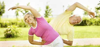 Older couple stretching